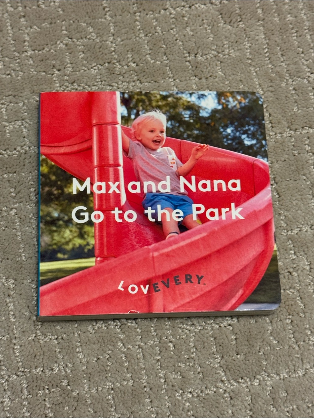 Lovevery: Max and Nana Go to the Park - Red Kids Board Book